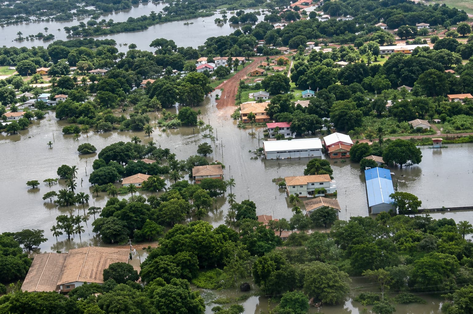 Aerial view of floodwaters covering homes and roads in Georgetown, Guyana, 2005